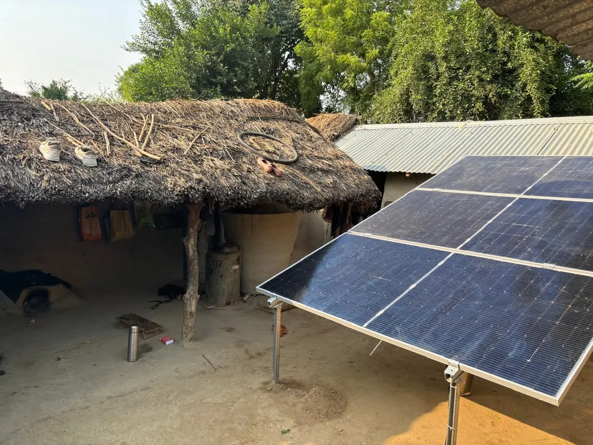 Solar panels installed in the courtyard of a rural home